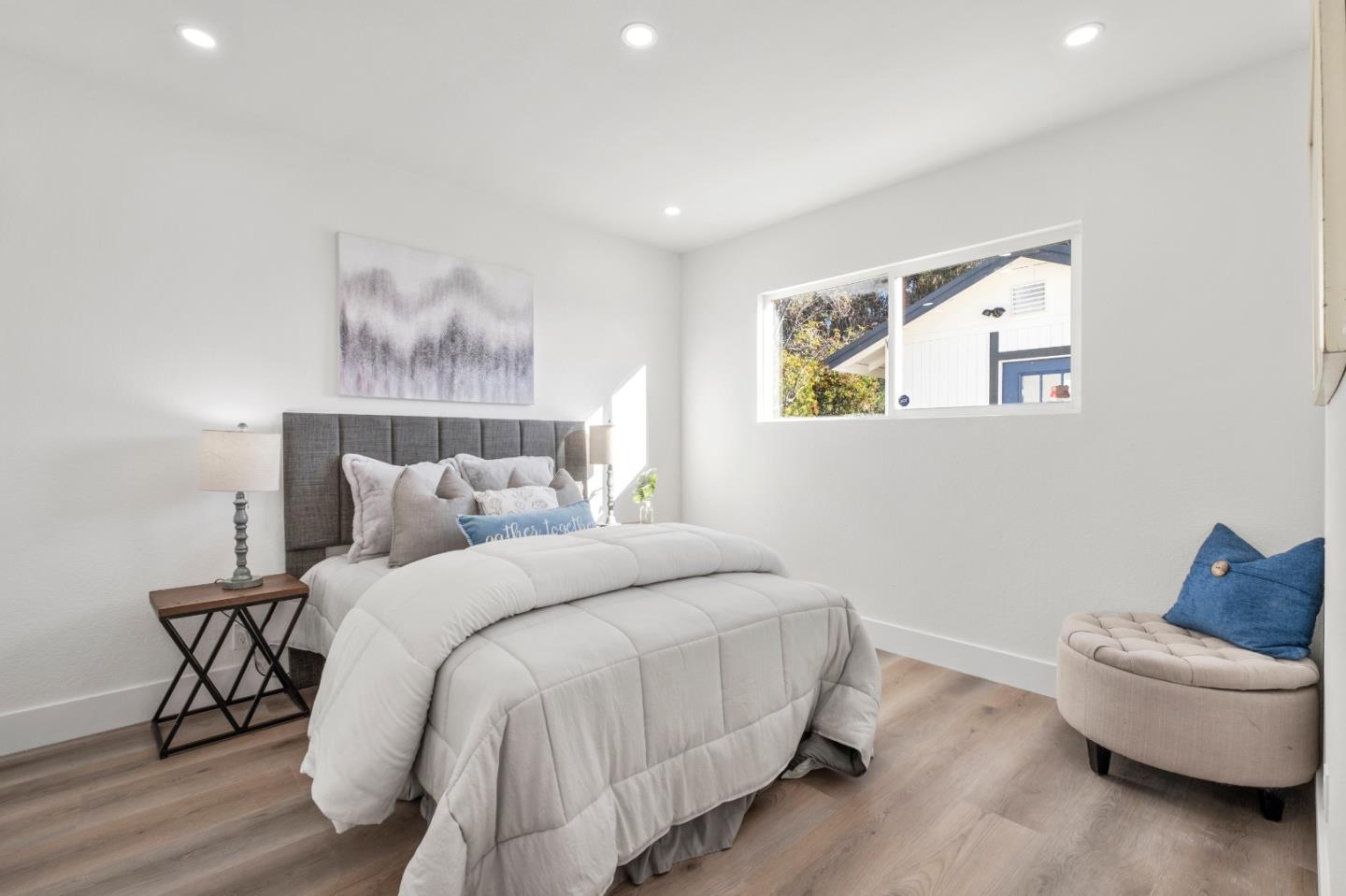 1014 Viewpointe Boulevard Rodeo, CA 94572 - Photo 10 of 20 a bedroom with a bed and a couch