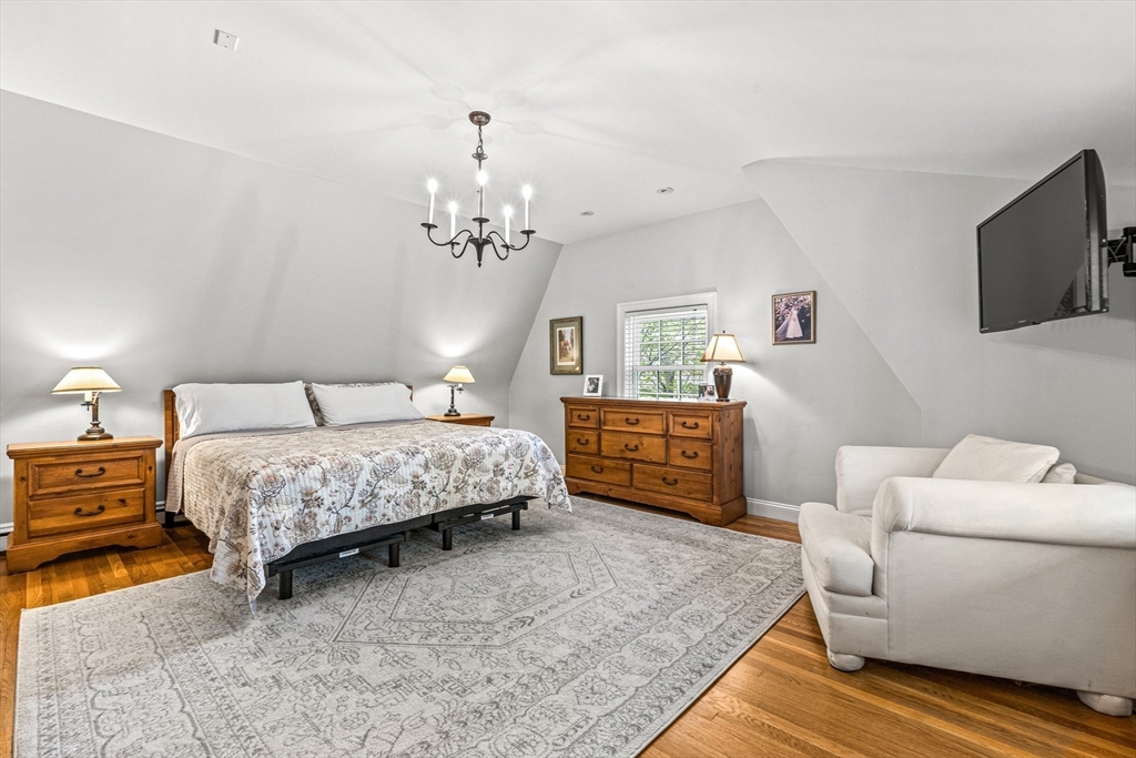2 Longfellow Road Wellesley, MA 02481 - Photo 12 of 28 a bedroom with a bed window and a television
