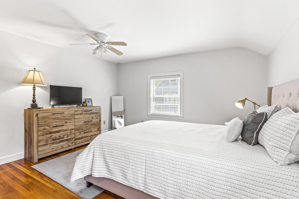 2 Longfellow Road Wellesley, MA 02481 - Photo 14 of 28 a bedroom with a bed and flat screen tv