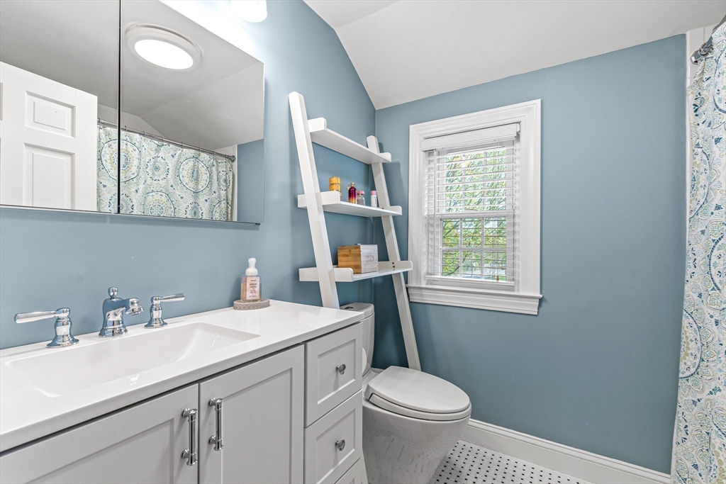 2 Longfellow Road Wellesley, MA 02481 - Photo 18 of 28 a bathroom with a sink toilet and a window