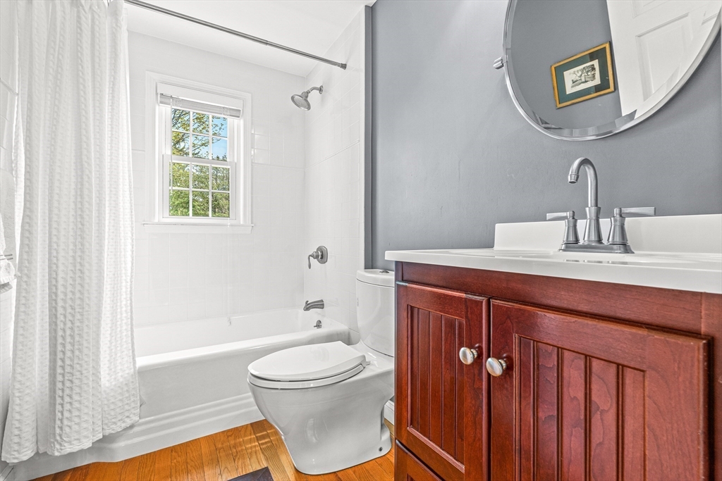 2 Longfellow Road Wellesley, MA 02481 - Photo 19 of 28 a bathroom with a sink a toilet and bathtub