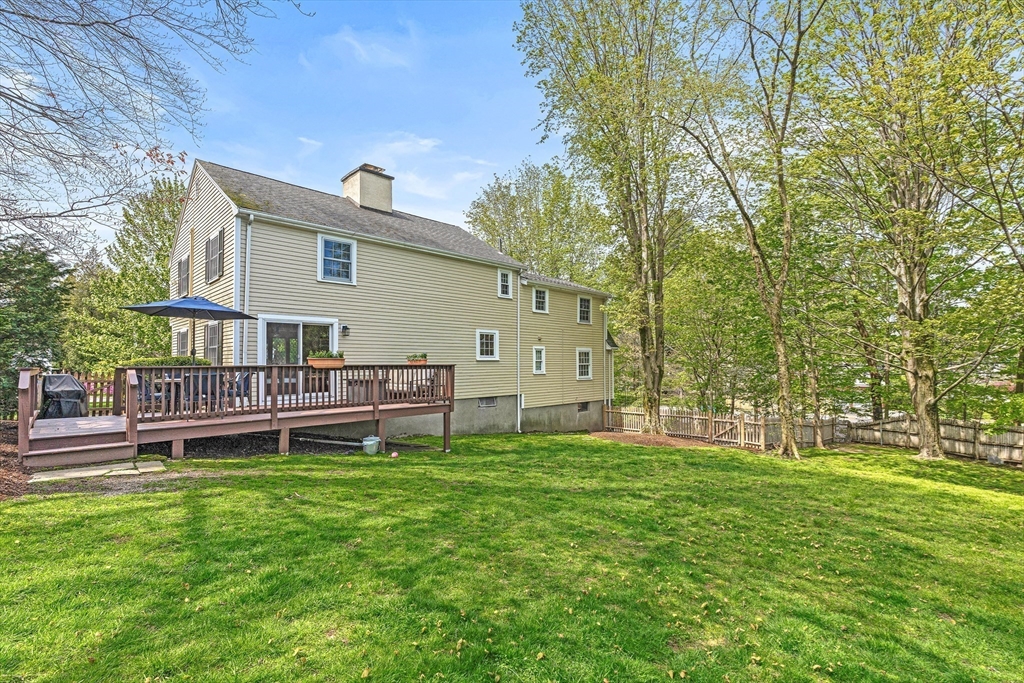 2 Longfellow Road Wellesley, MA 02481 - Photo 22 of 28 a view of a house with a yard and sitting area