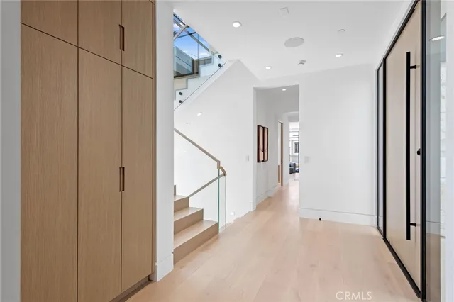 a close view of a sink a faucet and a potted plant