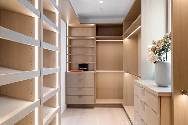 a front view of a building with a yard and seating space