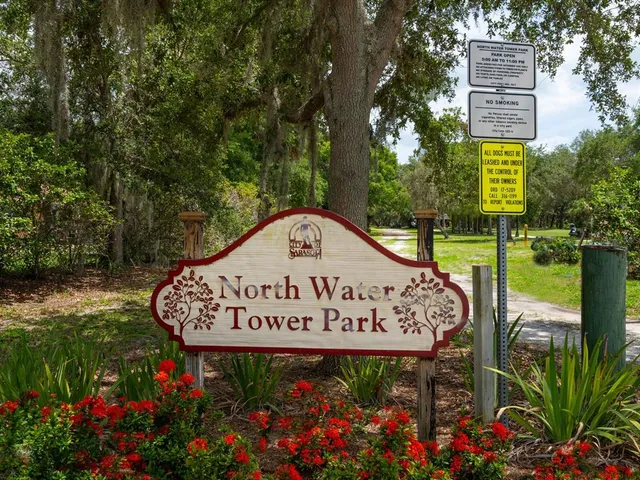 a sign that is sitting on the side of a road