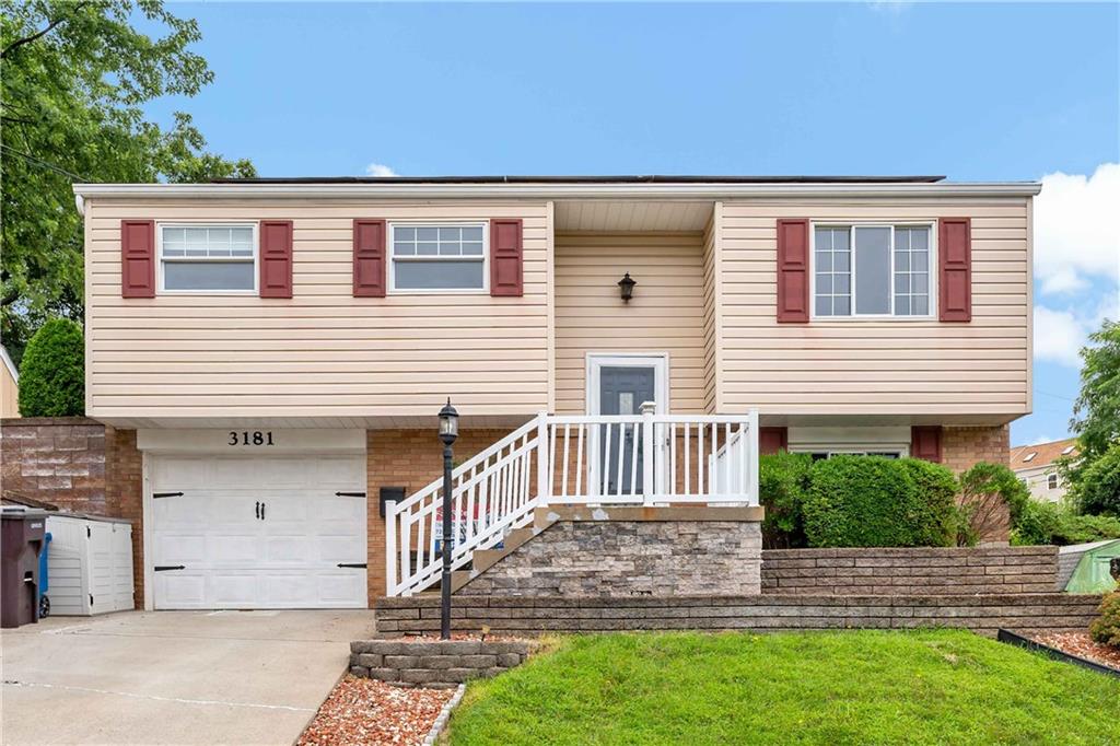 3181 Mellott Road Pittsburgh, PA 15227 - Photo 1 of 34 a front view of a house with a yard