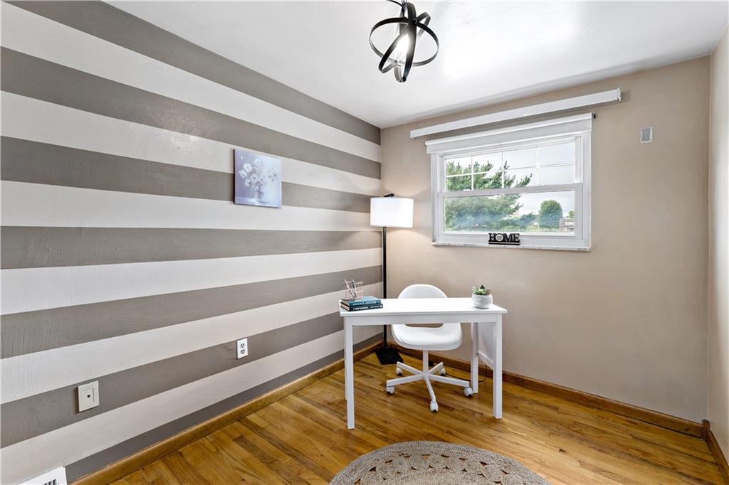 3181 Mellott Road Pittsburgh, PA 15227 - Photo 20 of 34 a dining room with wooden floor and a window