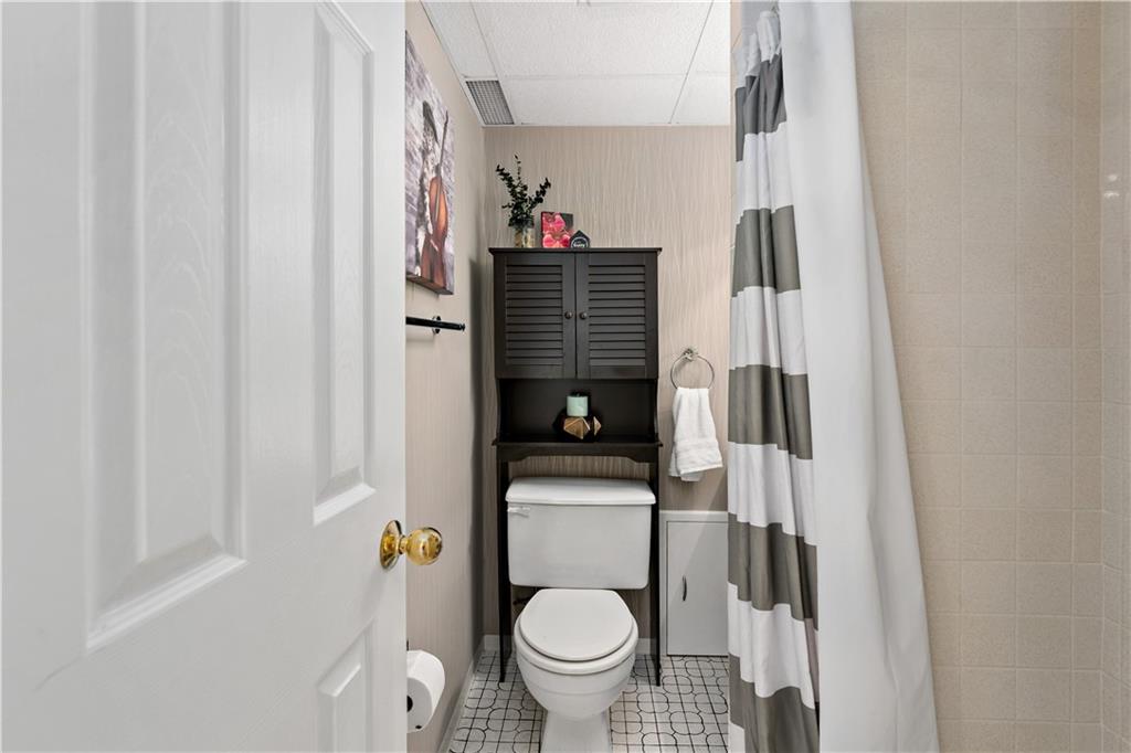 3181 Mellott Road Pittsburgh, PA 15227 - Photo 28 of 34 a bathroom with a toilet and a sink