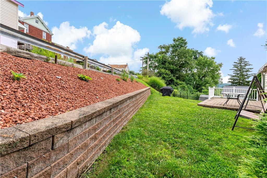 3181 Mellott Road Pittsburgh, PA 15227 - Photo 32 of 34 a view of a backyard with sitting area