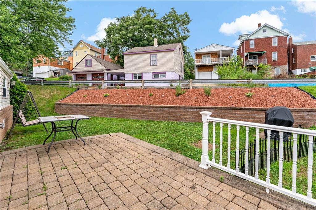 3181 Mellott Road Pittsburgh, PA 15227 - Photo 33 of 34 a front view of a house with garden