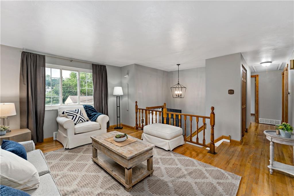 3181 Mellott Road Pittsburgh, PA 15227 - Photo 7 of 34 a living room with furniture and a large window