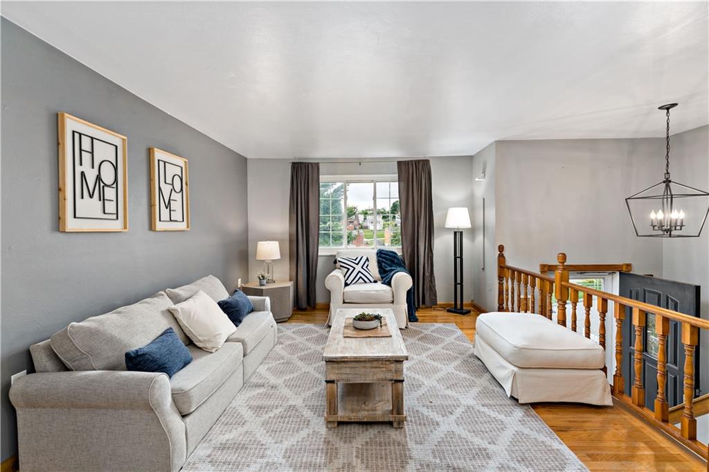3181 Mellott Road Pittsburgh, PA 15227 - Photo 8 of 34 a living room with furniture and a table