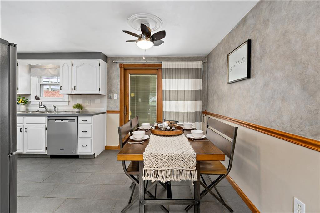3181 Mellott Road Pittsburgh, PA 15227 - Photo 9 of 34 a view of a dining room with furniture and a window