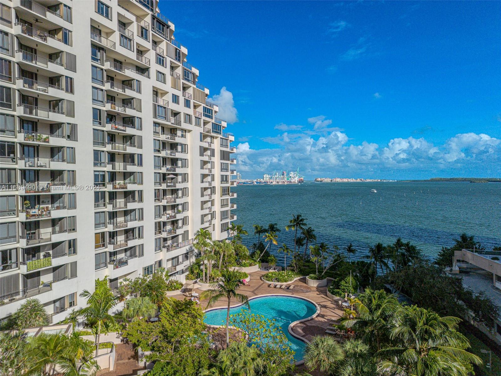 520 Brickell Key Drive, Unit A705 Miami, FL 33131 - Photo 1 of 66 a view of a lake with a building in the background