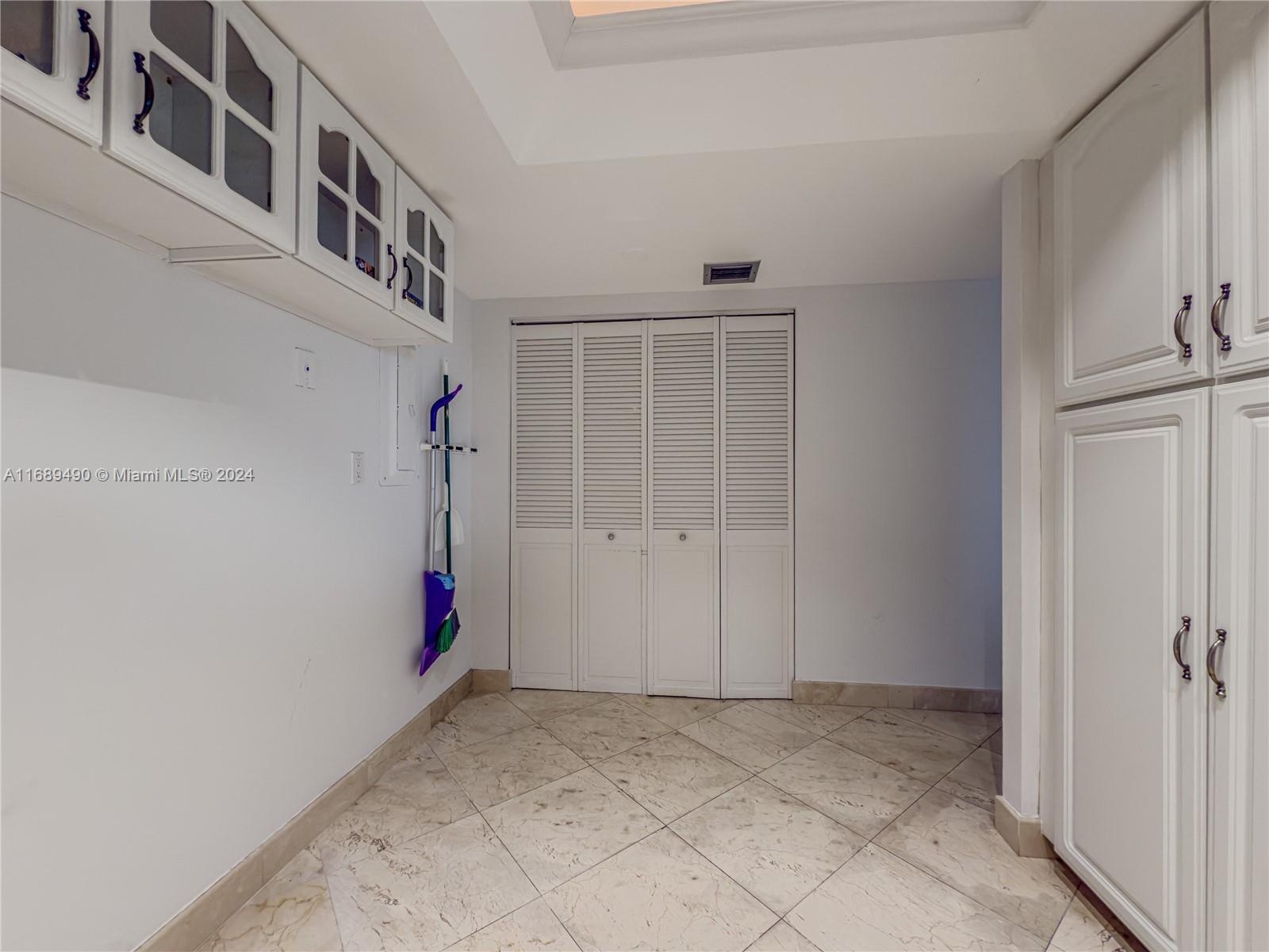 520 Brickell Key Drive, Unit A705 Miami, FL 33131 - Photo 14 of 66 a view of an entryway with a hallway