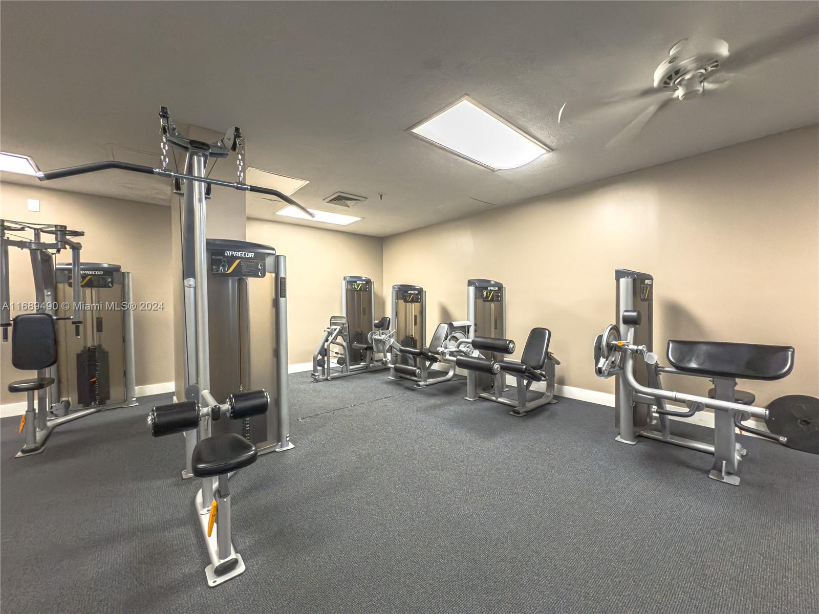 520 Brickell Key Drive, Unit A705 Miami, FL 33131 - Photo 43 of 66 a view of a room with gym equipment