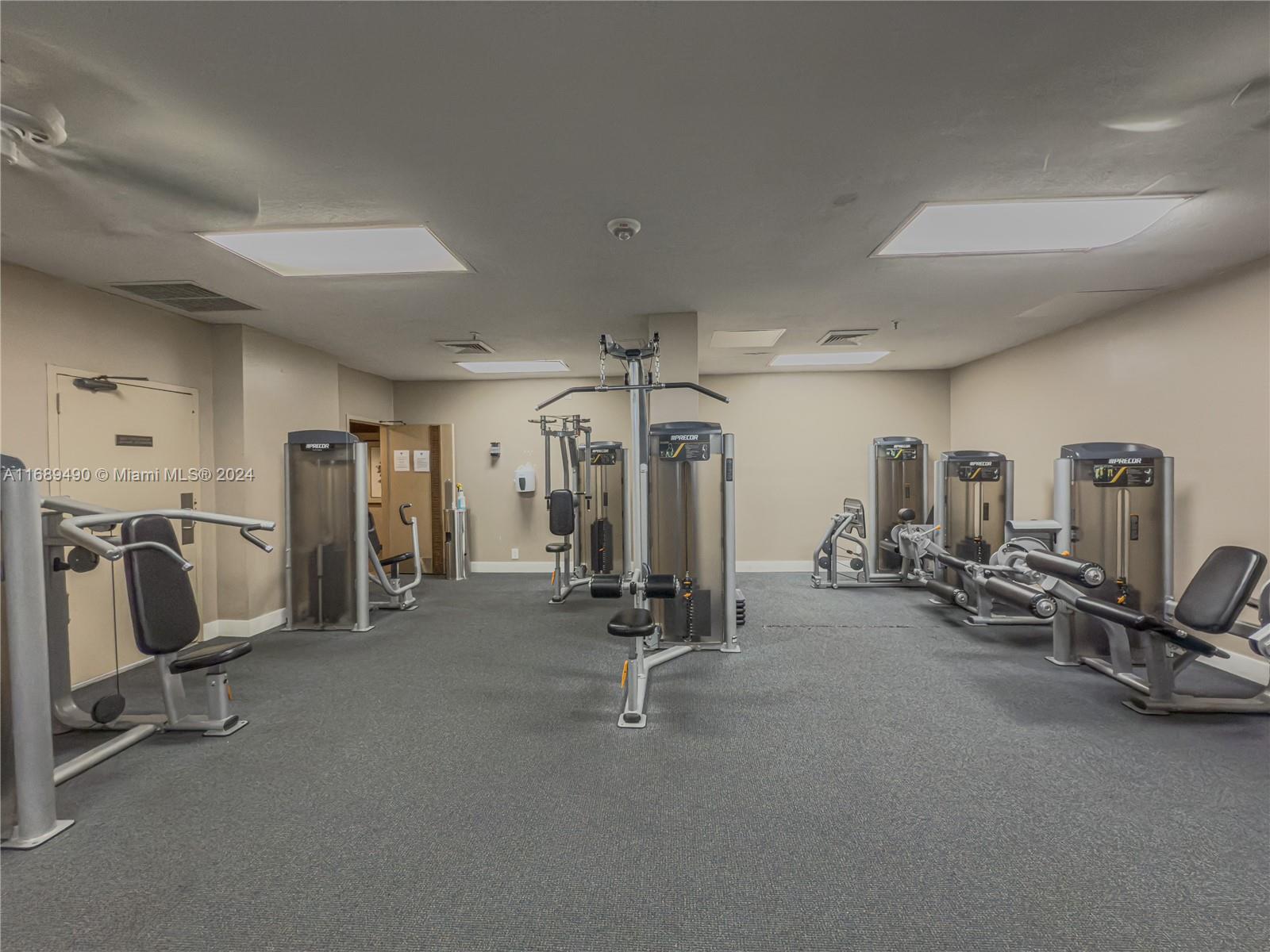 520 Brickell Key Drive, Unit A705 Miami, FL 33131 - Photo 46 of 66 a view of a room with gym equipment