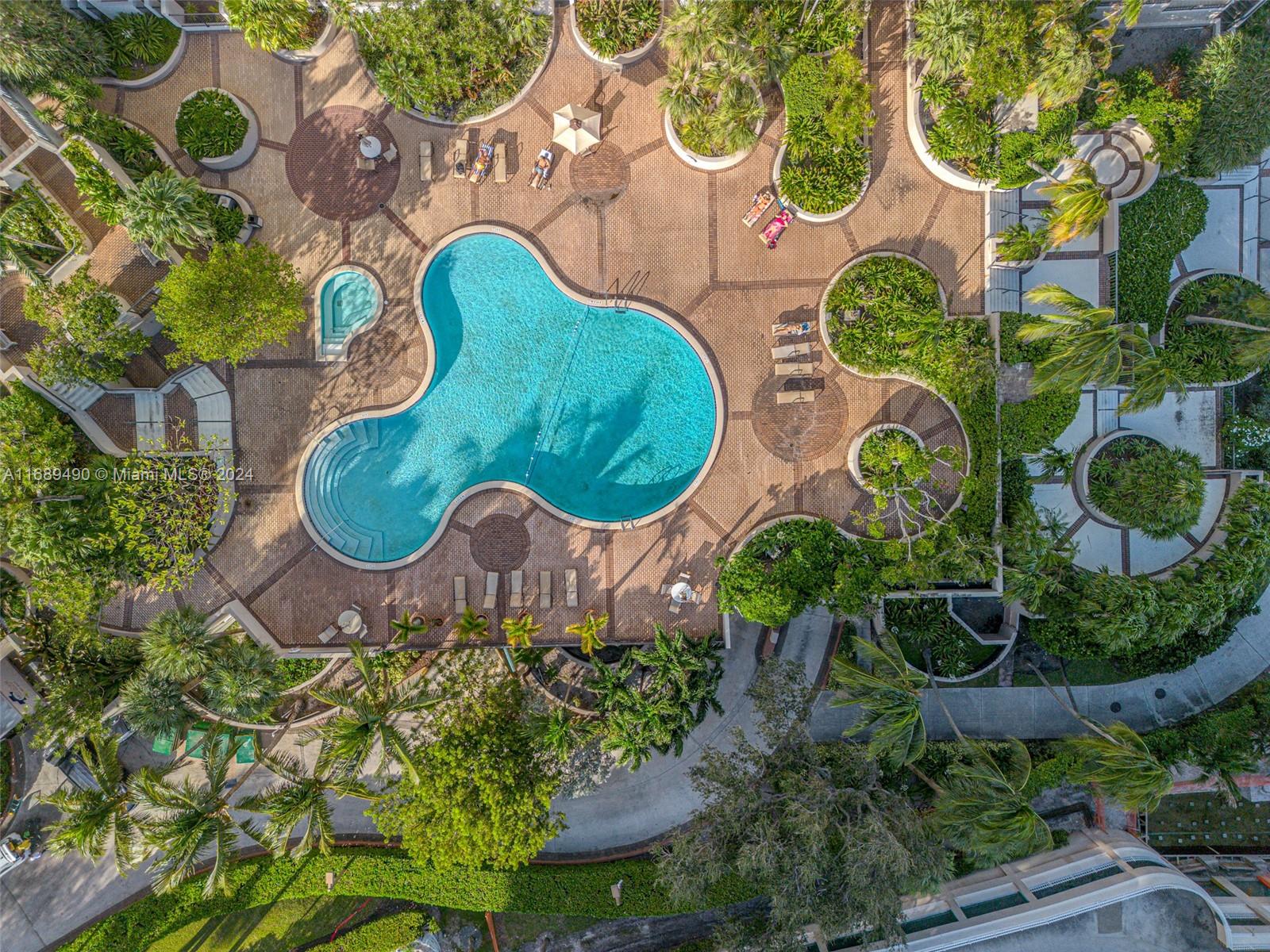 520 Brickell Key Drive, Unit A705 Miami, FL 33131 - Photo 49 of 66 an aerial view of a house with garden space and street view