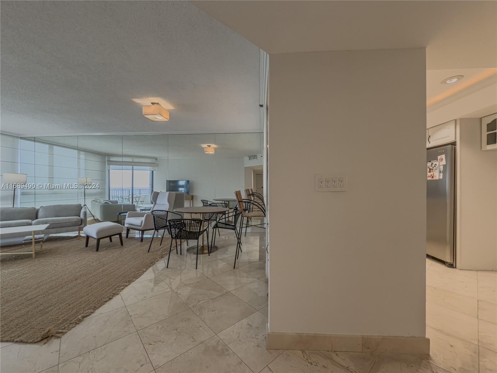 520 Brickell Key Drive, Unit A705 Miami, FL 33131 - Photo 8 of 66 a view of a dining room with furniture