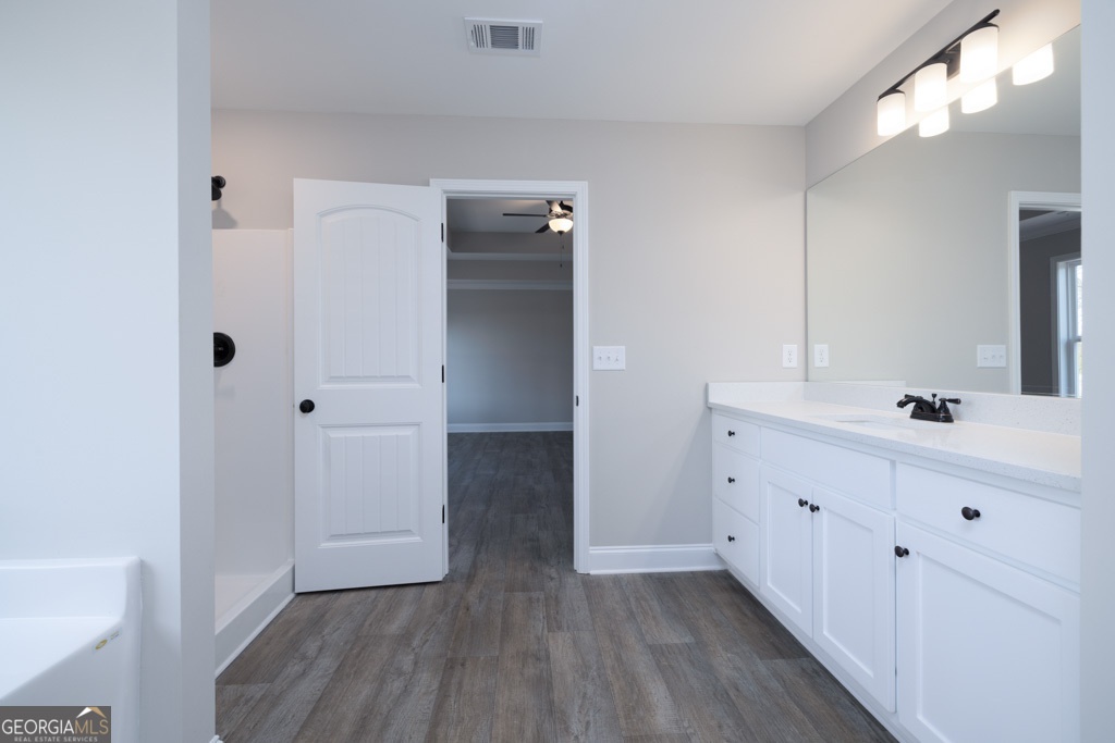 300 Grady Brock Road, Unit 20 Martin, GA 30557 - Photo 23 of 26 a view of bathroom with a sink mirror and window