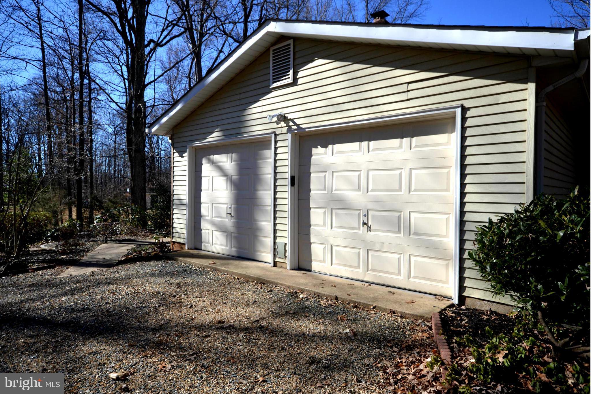 Oversized 2 car garage with workbench