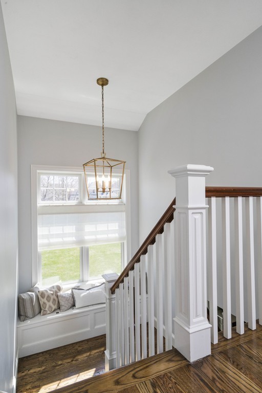 38 Smith Place Cohasset, MA 02025 - Photo 13 of 28 a living room with furniture and a chandelier