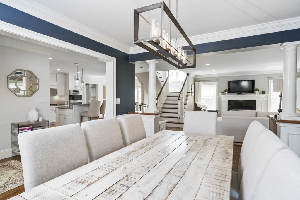 38 Smith Place Cohasset, MA 02025 - Photo 4 of 28 a living room with furniture and a chandelier