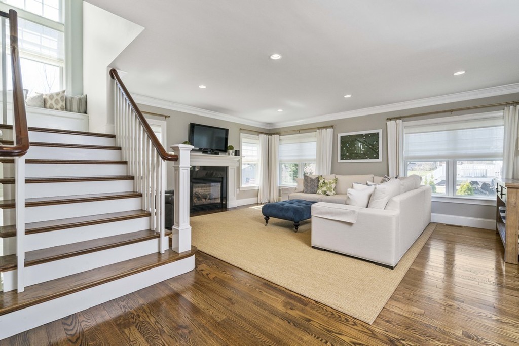 38 Smith Place Cohasset, MA 02025 - Photo 5 of 28 a living room with furniture and a fireplace