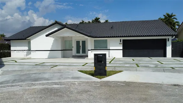 a view of a house with a sink and garage