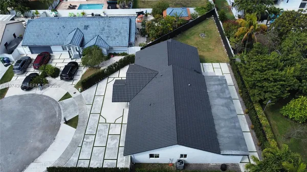 a bathroom with a sink a toilet and a shower