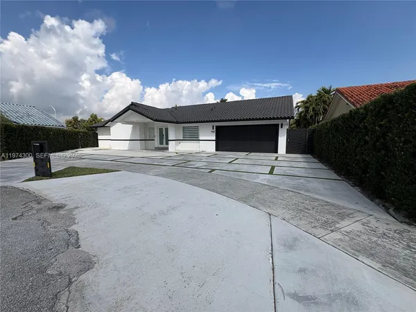 a house with trees in front of it