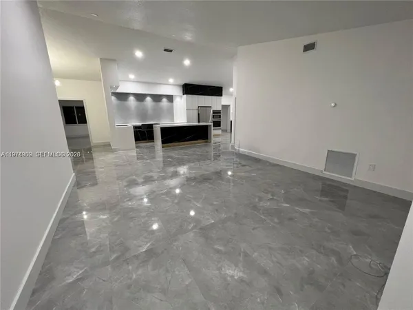 a view of kitchen with a sink
