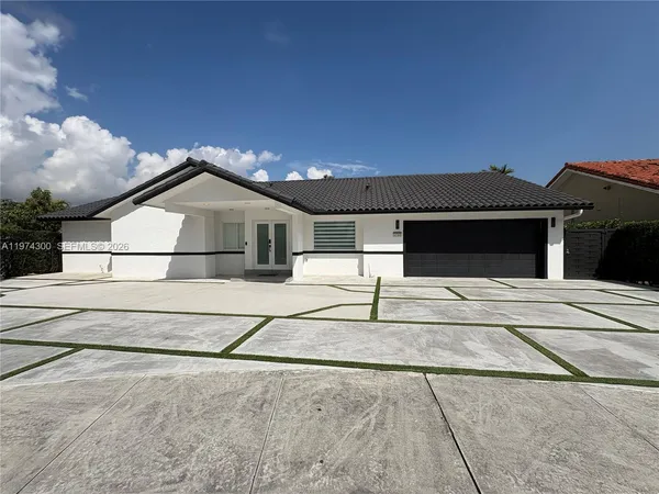 a view of a house with a large space