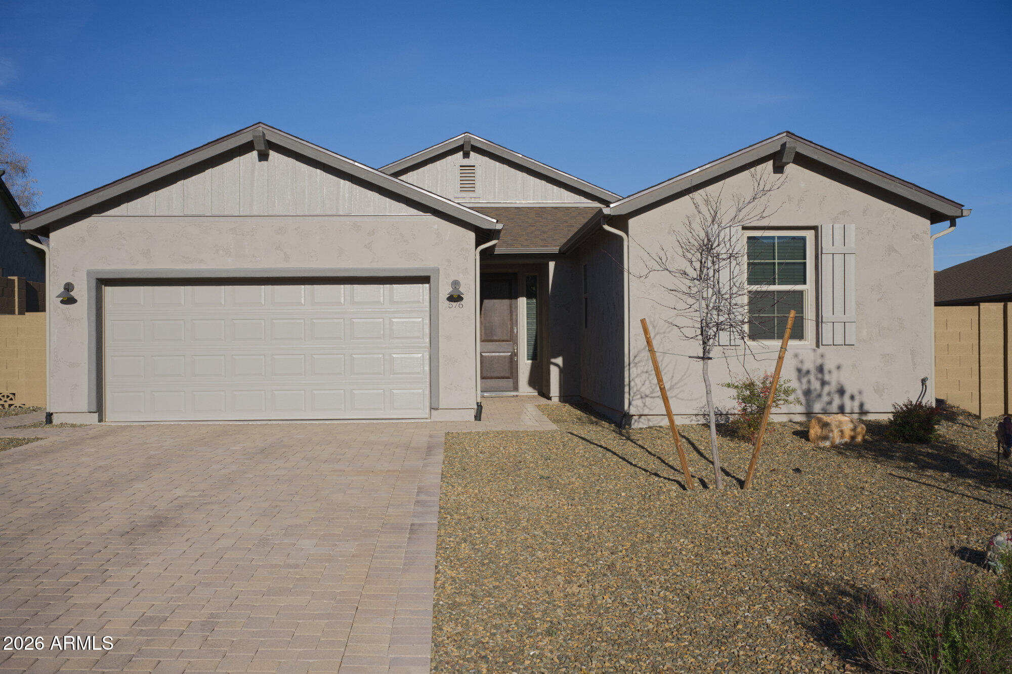 a view of garage and yard