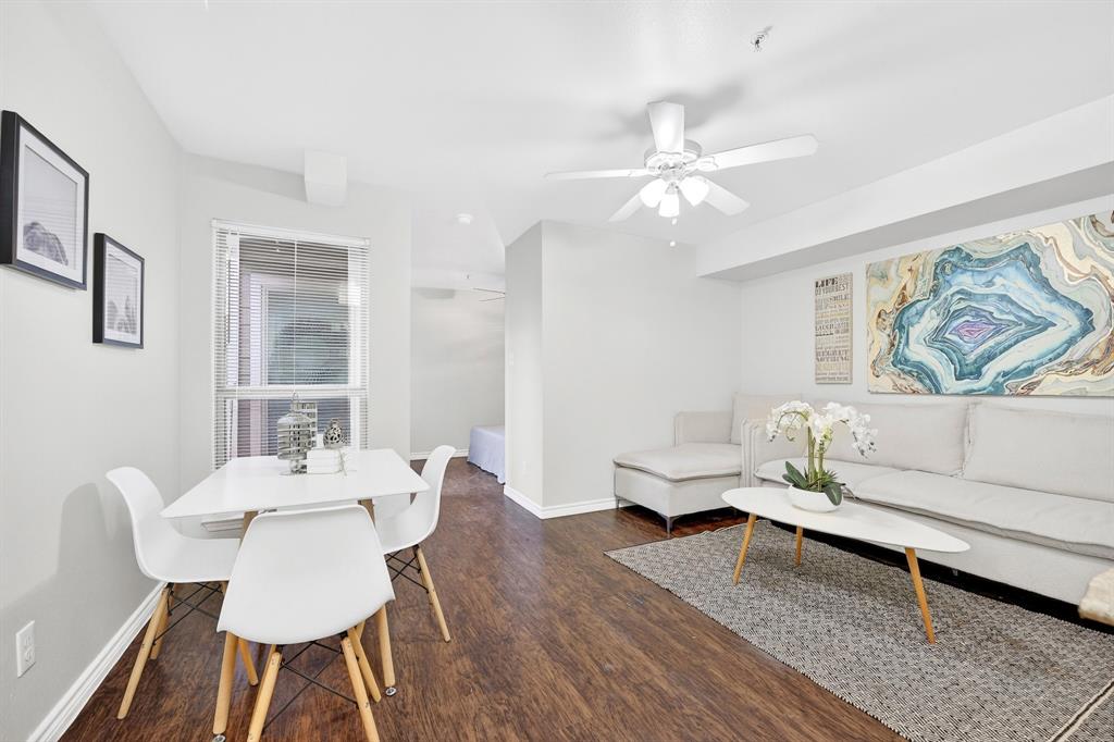 9829 Walnut Street, Unit 308 Dallas, TX 75243 - Photo 15 of 24 a living room with furniture and a table