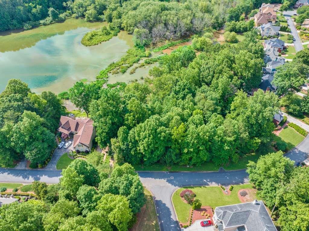 2276 Lake Ridge Terrace Lawrenceville, GA 30043 - Photo 11 of 13 an aerial view of a house with a yard