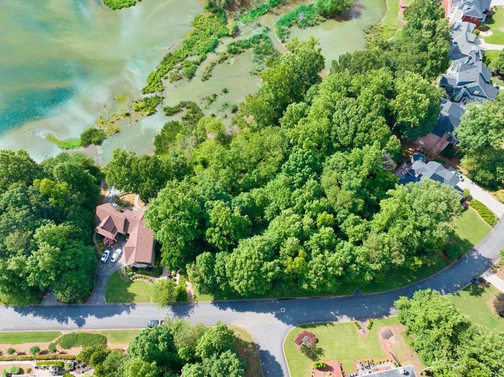 2276 Lake Ridge Terrace Lawrenceville, GA 30043 - Photo 6 of 13 an aerial view of residential house with outdoor space and swimming pool