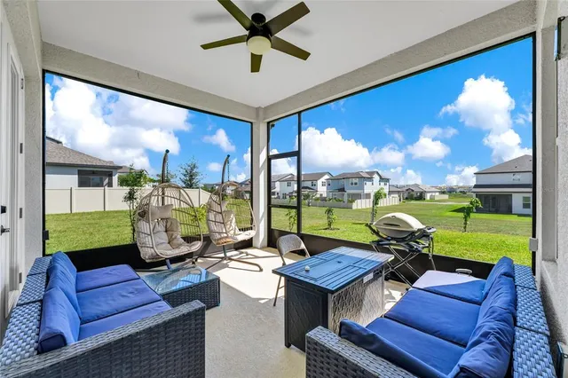 a outdoor living space with furniture and garden view