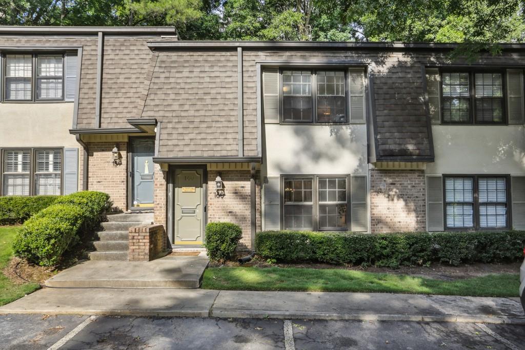 a front view of a house having yard