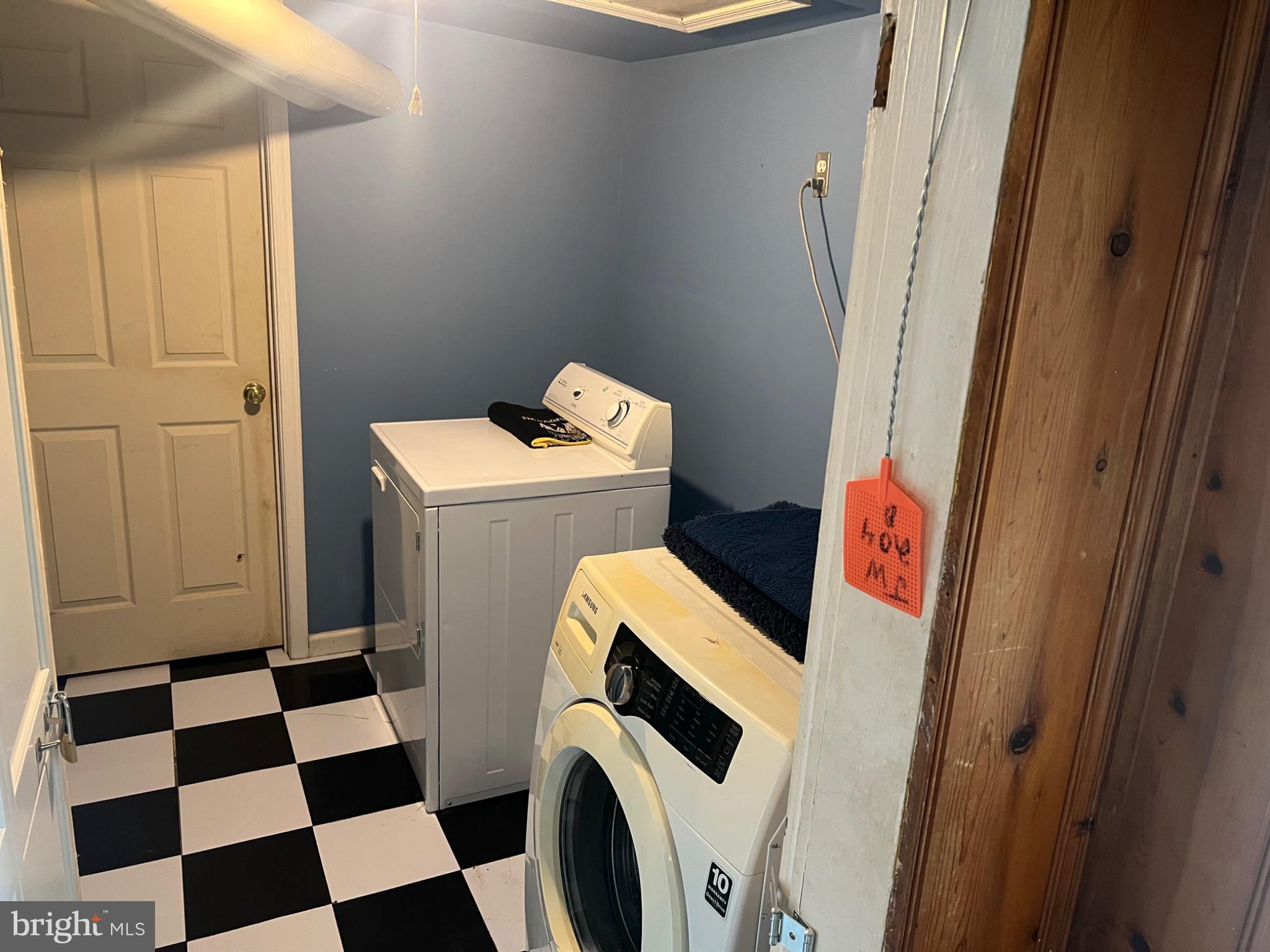 10 Willis Street Cambridge, MD 21613 - Photo 12 of 27 Charming laundry nook with style.