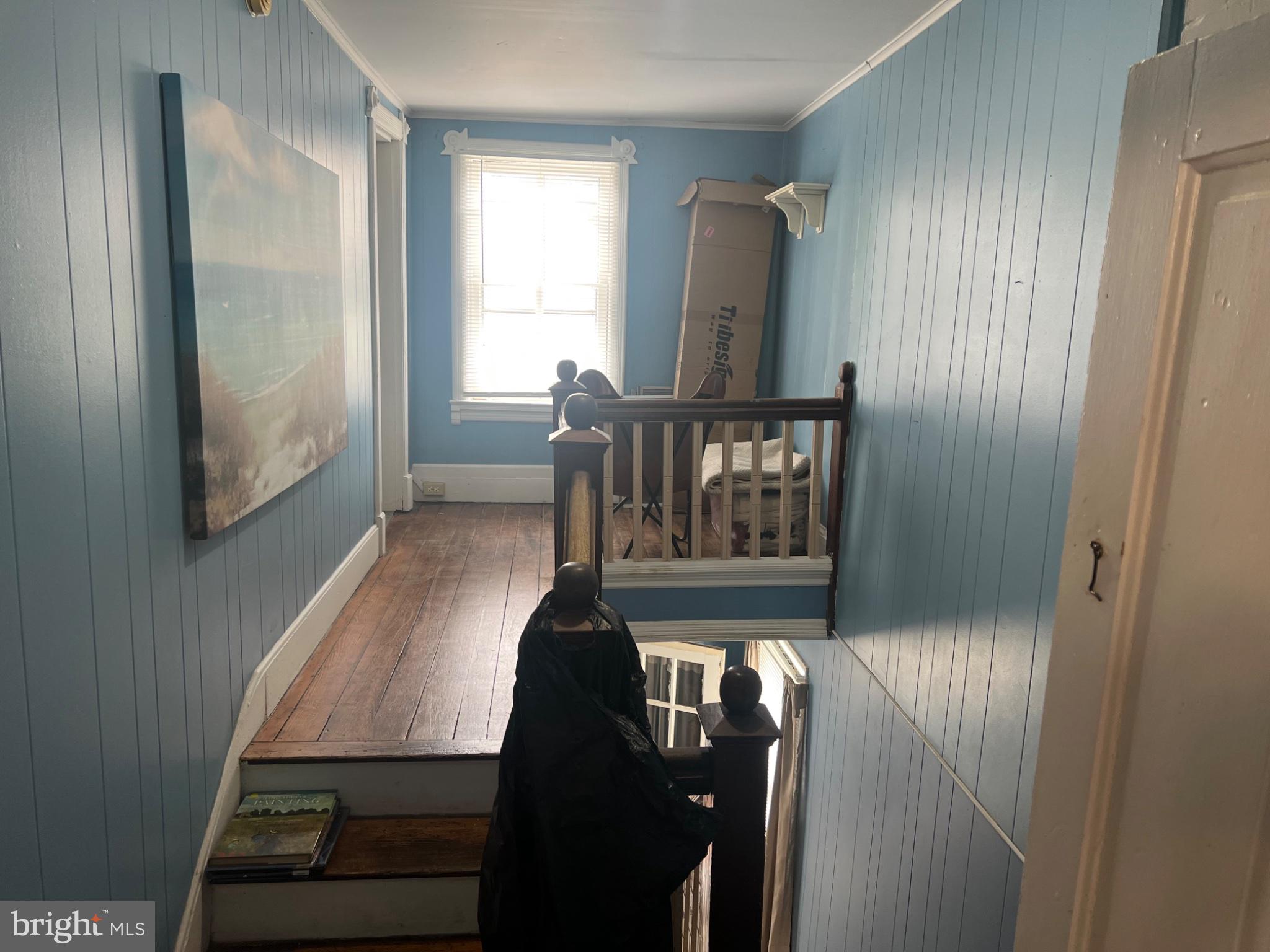 10 Willis Street Cambridge, MD 21613 - Photo 24 of 27 Charming blue-hued entryway awaits.