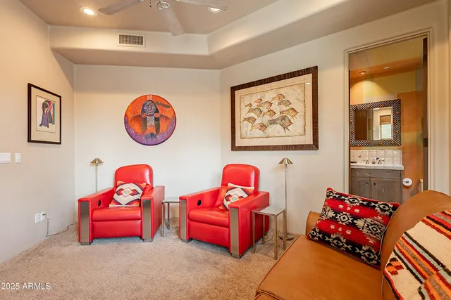 a hallway with flowers in front of main door