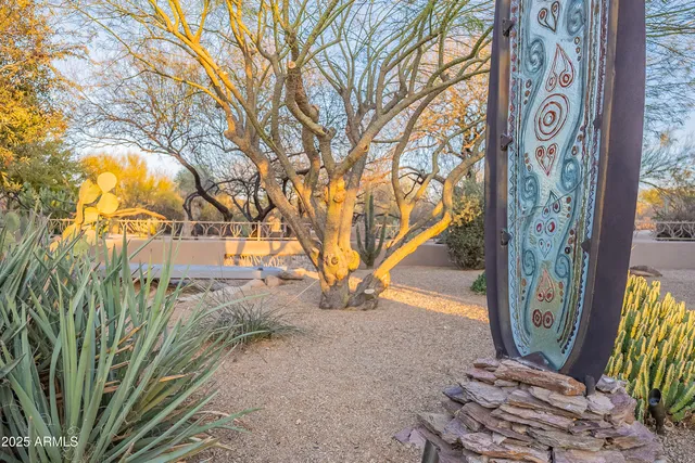 a outdoor sitting area with furniture and city view