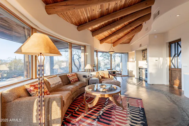 a view of a workspace with furniture and a couch