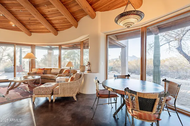 a view of an outdoor sitting area with a swimming pool