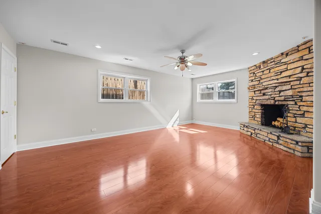 a view of livingroom with window fireplace and microwave