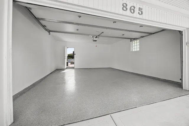 a view of a hallway with a wooden floors