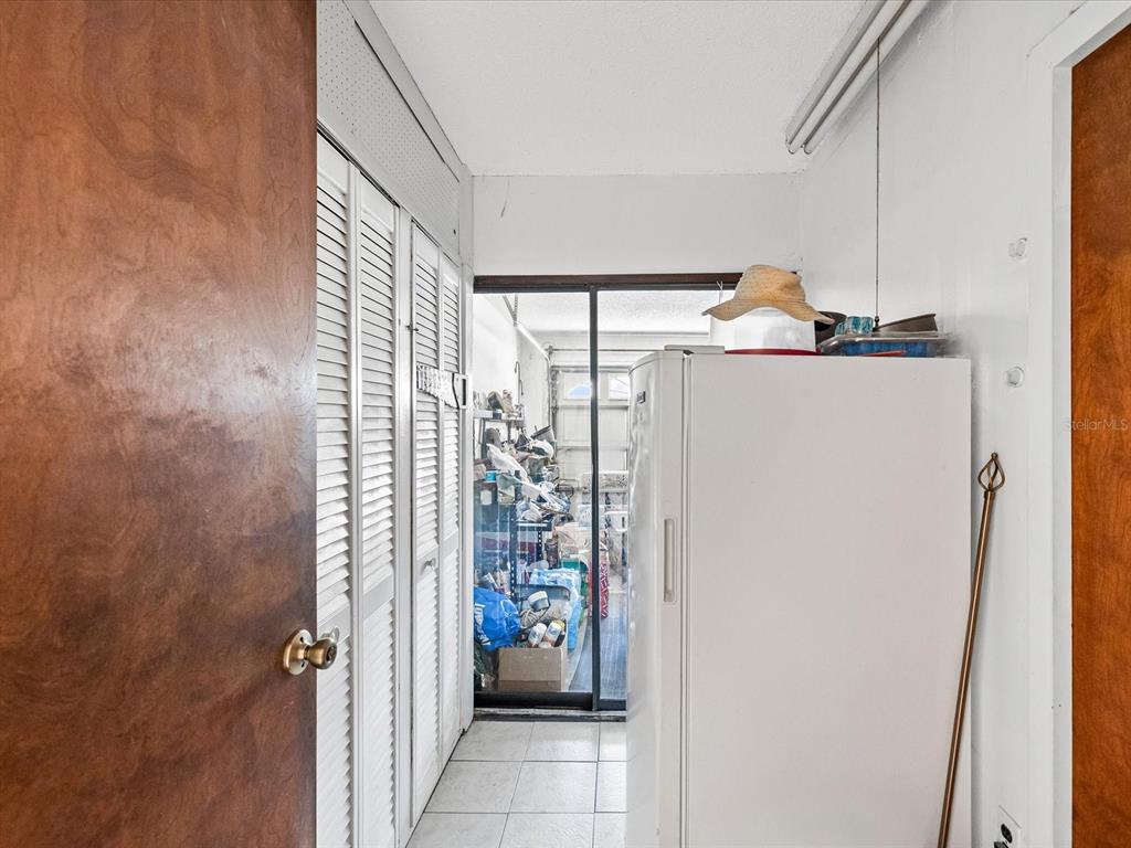 18824 Parade Road Hudson, FL 34667 - Photo 13 of 38 a bathroom with a shower and a window