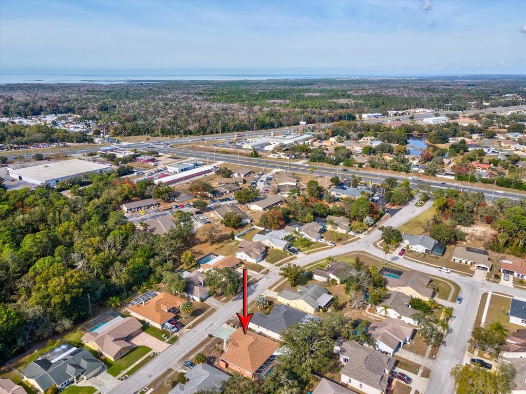 18824 Parade Road Hudson, FL 34667 - Photo 37 of 38 an aerial view of a city with lots of residential buildings