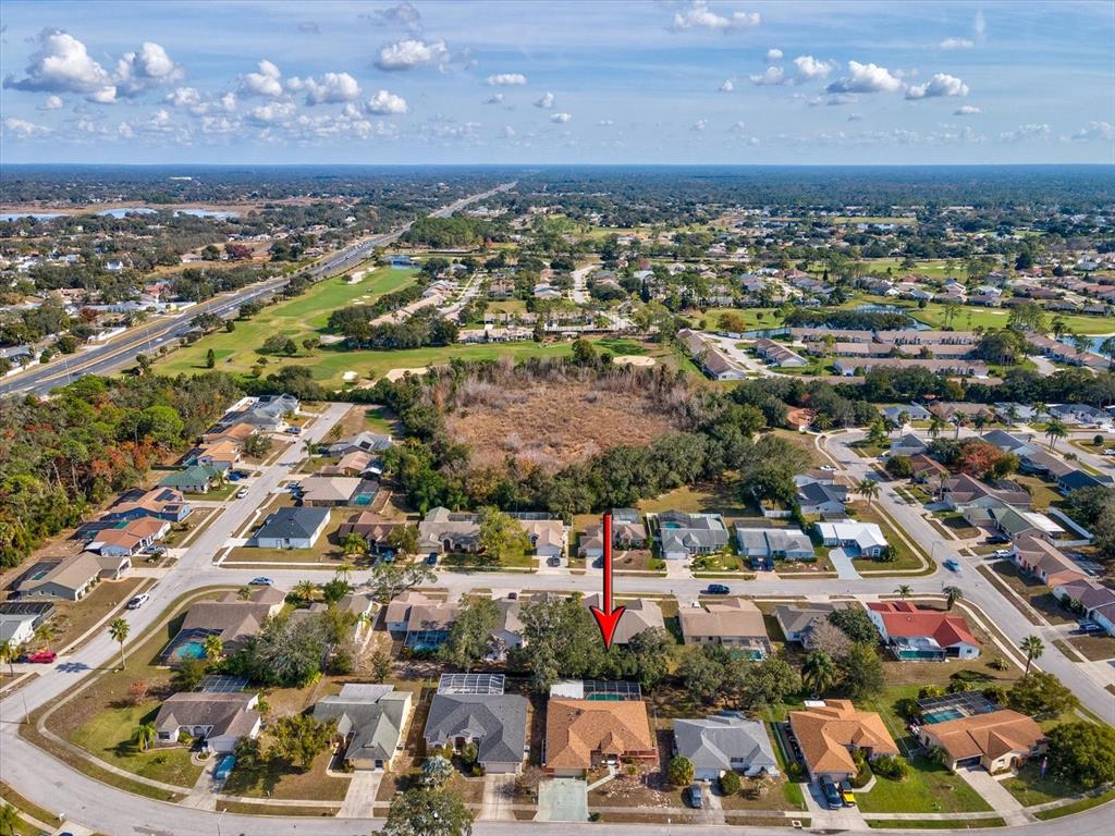 18824 Parade Road Hudson, FL 34667 - Photo 4 of 29 an aerial view of a city